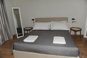 Postel nebo postele na pokoji v ubytování Torre Balzano B&B