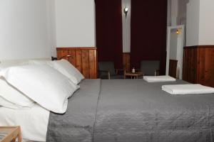 Postel nebo postele na pokoji v ubytování Torre Balzano B&B