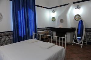 Postel nebo postele na pokoji v ubytování Torre Balzano B&B