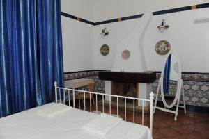 Postel nebo postele na pokoji v ubytování Torre Balzano B&B