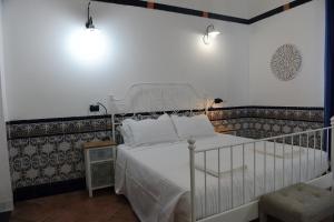 Postel nebo postele na pokoji v ubytování Torre Balzano B&B