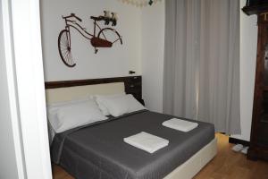 Postel nebo postele na pokoji v ubytování Torre Balzano B&B