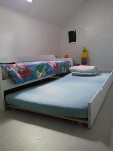 Кровать или кровати в номере maison de loire
