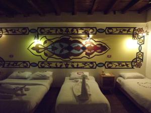 Lova arba lovos apgyvendinimo įstaigoje Nefertiti Hotel Luxor