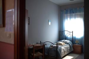 Postel nebo postele na pokoji v ubytování B&B Armonia