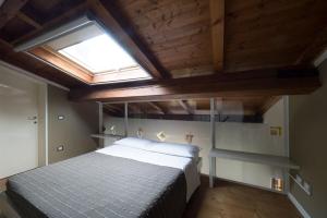 Postel nebo postele na pokoji v ubytování Alkimia Smart Rooms