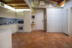 Kuchyň nebo kuchyňský kout v ubytování Alkimia Smart Rooms