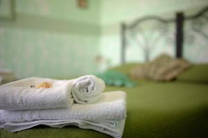 Postel nebo postele na pokoji v ubytování B&B Armonia