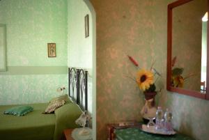 Postel nebo postele na pokoji v ubytování B&B Armonia