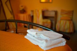 Postel nebo postele na pokoji v ubytování B&B Armonia