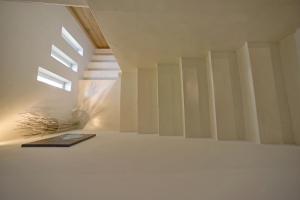 Katil atau katil-katil dalam bilik di Mavres Luxury Loft