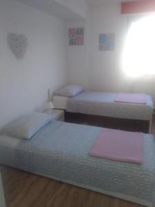Posteľ alebo postele v izbe v ubytovaní Apartment Volme