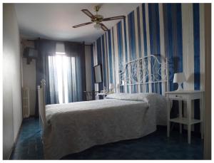 Postel nebo postele na pokoji v ubytování Piccolo Hotel Direkt am See