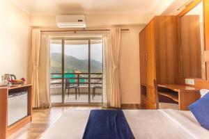 Postel nebo postele na pokoji v ubytování Hotel White Pearl