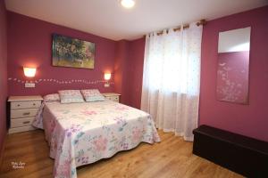 Postel nebo postele na pokoji v ubytování Apartamentos Bouso