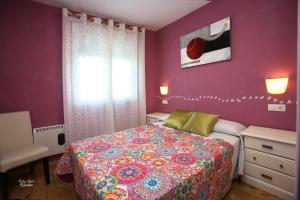 Postel nebo postele na pokoji v ubytování Apartamentos Bouso