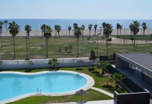 Gallery image of Apartamento Lujo, Primera linea playa, Garaje, Wifi, Piscina climatizada in Roquetas de Mar