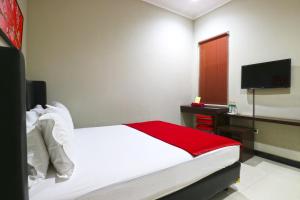 Sjónvarps- og/eða afþreyingartæki á Chiaro Hotel Syariah