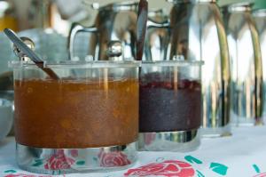 two containers of food sitting on a table at Riviera Perdika Hotel in Perdika