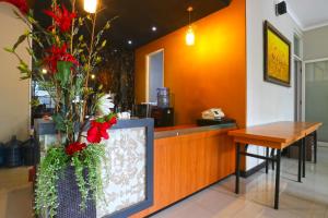 Eldhús eða eldhúskrókur á Chiaro Hotel Syariah