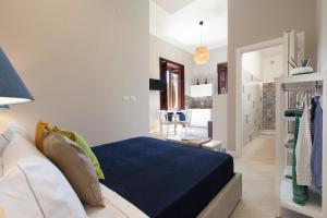 Ένα ή περισσότερα κρεβάτια σε δωμάτιο στο Villa Elide