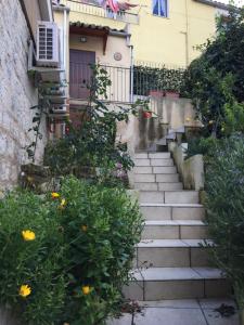 a set of stairs leading up to a house at SoleLuna House in Modica