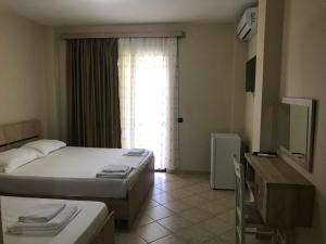 Postel nebo postele na pokoji v ubytování Hotel Villa Aljor
