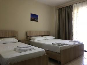 Postel nebo postele na pokoji v ubytování Hotel Villa Aljor