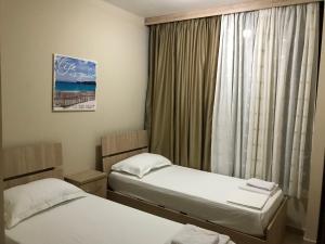 Postel nebo postele na pokoji v ubytování Hotel Villa Aljor