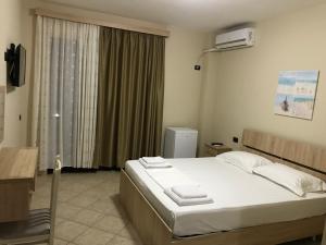 Postel nebo postele na pokoji v ubytování Hotel Villa Aljor