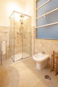 A bathroom at Traveller’s Home in Gourmet District Near Center!