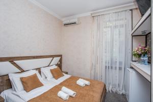 Postel nebo postele na pokoji v ubytování Teatron
