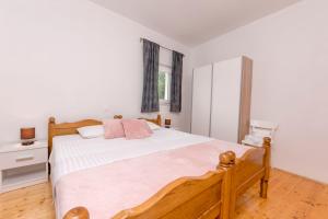 Postel nebo postele na pokoji v ubytování House Ante