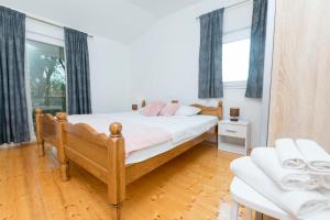 Postel nebo postele na pokoji v ubytování House Ante