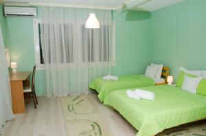 Voodi või voodid majutusasutuse Villa Re3ca toas