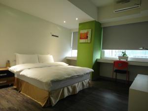 Postel nebo postele na pokoji v ubytování 237 Hotel