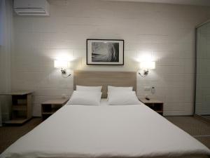Posteľ alebo postele v izbe v ubytovaní TIME hotel