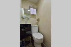 Ένα μπάνιο στο B&B Mongkok Hotel