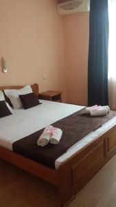 Postel nebo postele na pokoji v ubytování Dreams Family Hotel