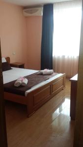 Postel nebo postele na pokoji v ubytování Dreams Family Hotel