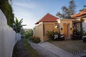 Zahrada ubytování Umah Tikari Guesthouse