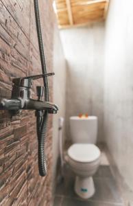 Koupelna v ubytování Umah Tikari Guesthouse