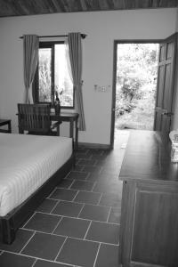 Krevet ili kreveti u jedinici u okviru objekta Sam Ong Lang Homestay