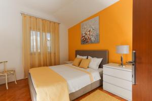 Postel nebo postele na pokoji v ubytování Apartment Tonka