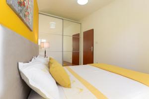 Postel nebo postele na pokoji v ubytování Apartment Tonka