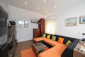 TV a/nebo společenská místnost v ubytování Apartment Tonka