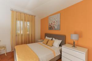 Postel nebo postele na pokoji v ubytování Apartment Tonka