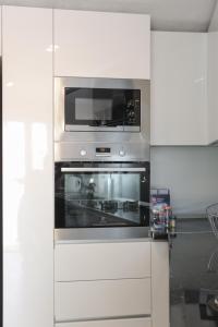 Kuchyň nebo kuchyňský kout v ubytování Apartment Tonka