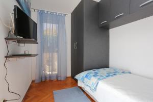 Postel nebo postele na pokoji v ubytování Apartment Tonka