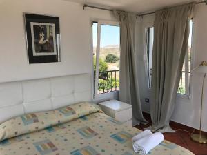 Postel nebo postele na pokoji v ubytování Casa Cabo de Gata